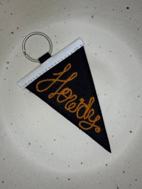 Pennant Keychain "Howdy"